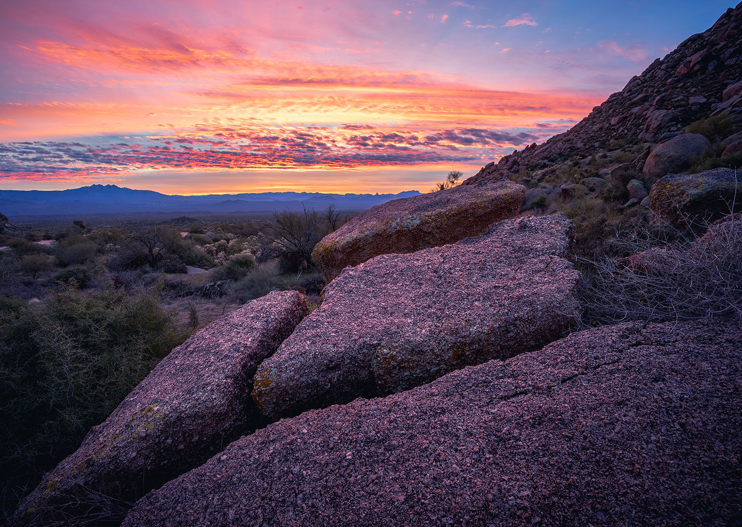 Vibrant colors fill the sky in a view from the McDowell Sonoran Preserve, near Scottsdale. Photograph by Eric Mischke.