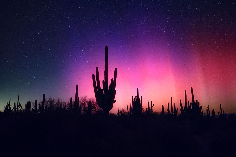 Sean Parker happened to be leading a Milky Way photography workshop near San Manuel, northeast of Tucson, the night the aurora borealis appeared in Arizona. He made this photo at about 1 a.m.