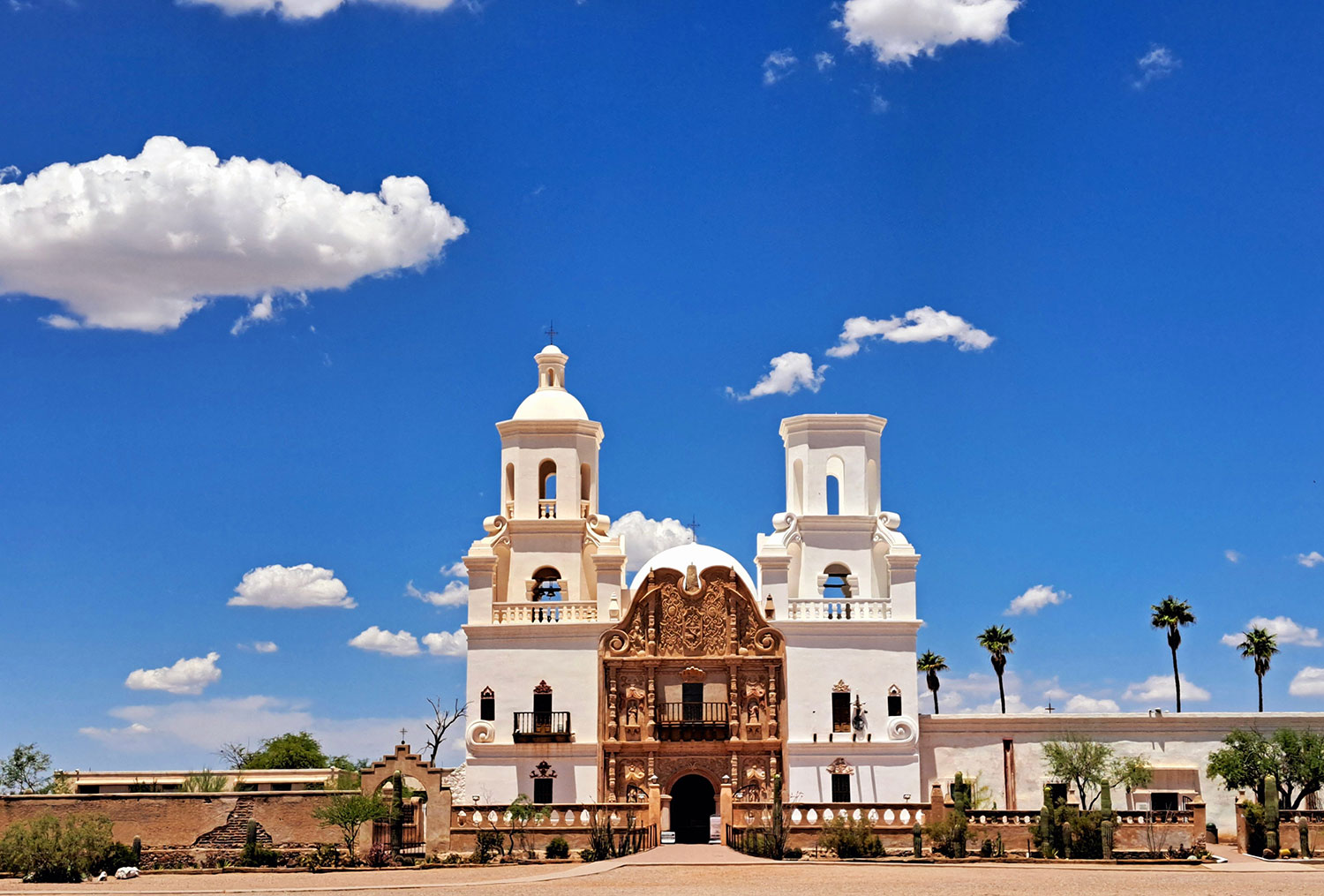 Mission San Xavier del Bac, near Tucson, stands in stark contrast to a deep blue sky. By Jared Raymond