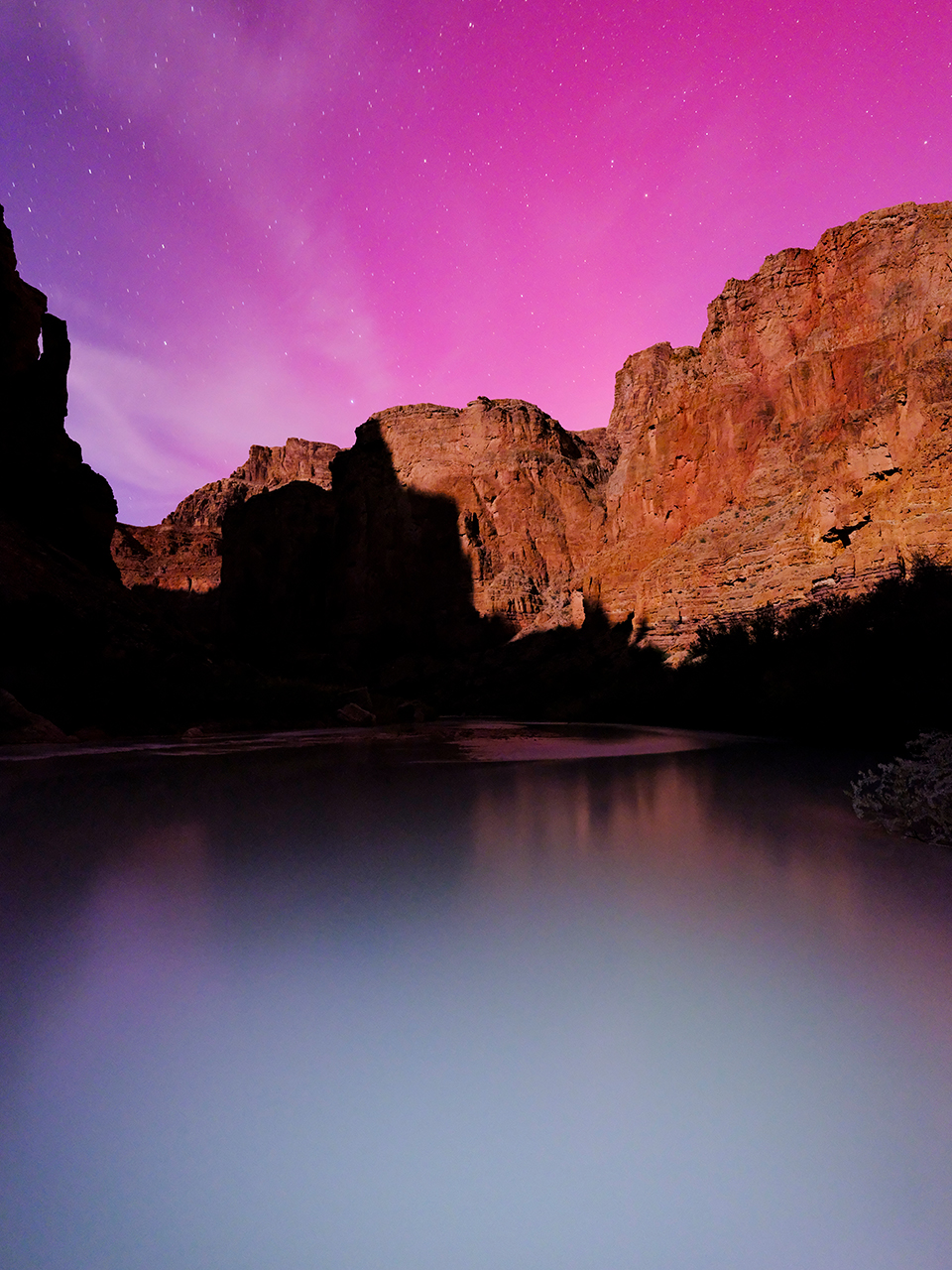 The Little Colorado River offers a unique view of October’s northern lights near where the river empties into the Colorado in the Canyon. The photographer used a technique called light painting to illuminate the river in the foreground. | Jonathan Buford