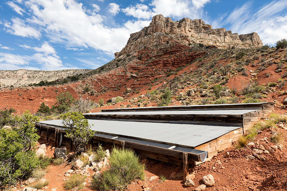 A nearly 10,000-gallon rainwater catchment system provides water for the station’s cabin and barn. By John Burcham