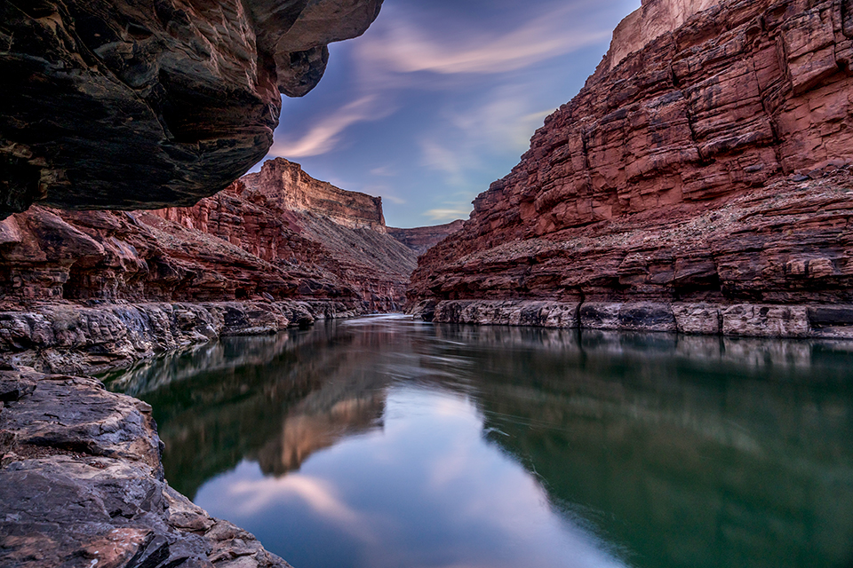 A long exposure in twilight lends an eerie vibe to a rocky section of Marble Canyon, the upstream section of Grand Canyon National Park. This spot is just upstream from Tanner Wash and Sheer Wall Rapid, at Mile 14 of the Colorado’s 277-mile journey through the Canyon.