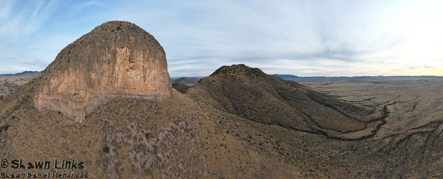 Vertical cliff faces help defend Mount Bruce, in the Mustang Mountains, from casual hikers. By Shawn Hendricks