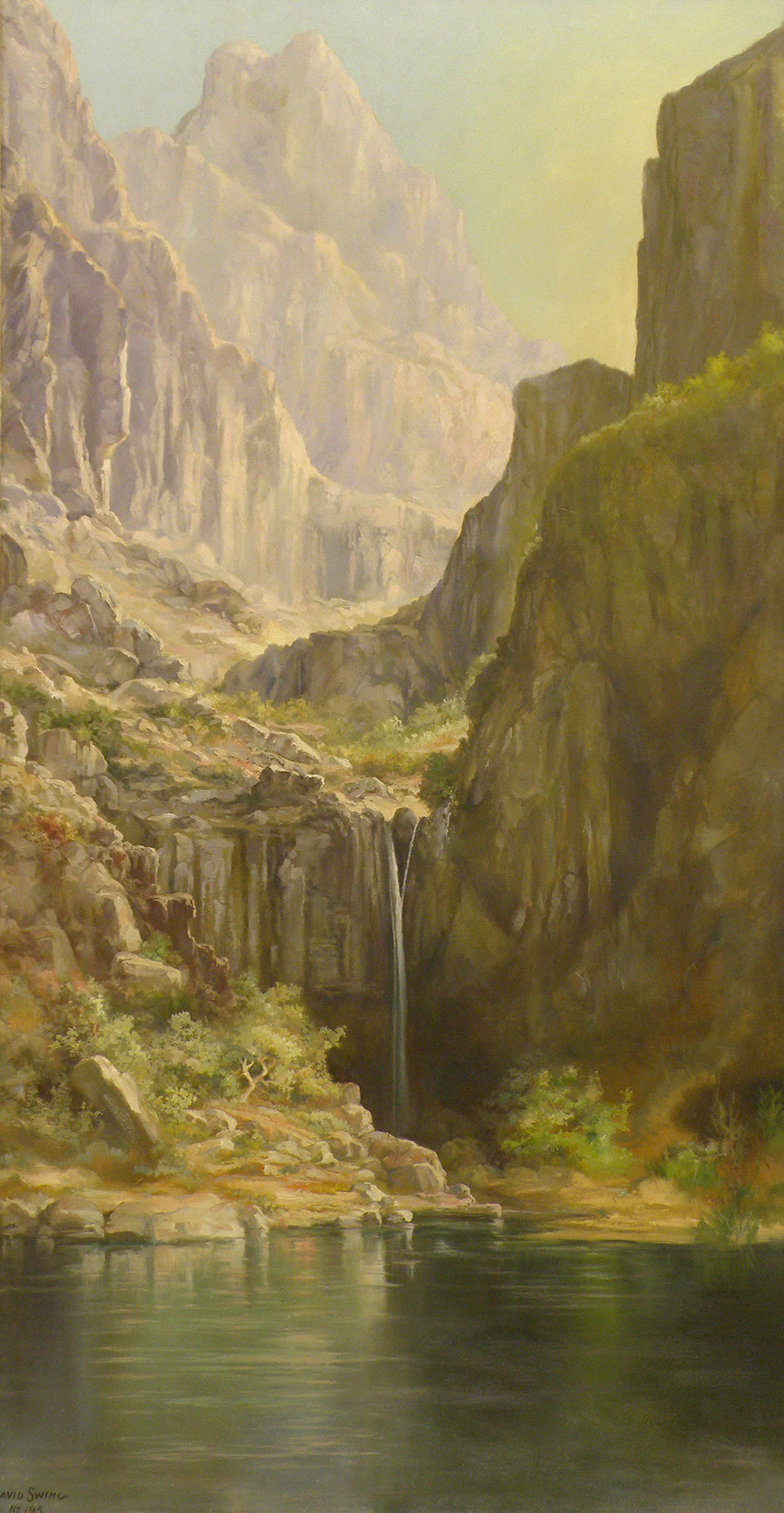 LAKE MEAD, a painting by David Swing, shows a waterfall trickling from a rocky mountain landscape into the water below.