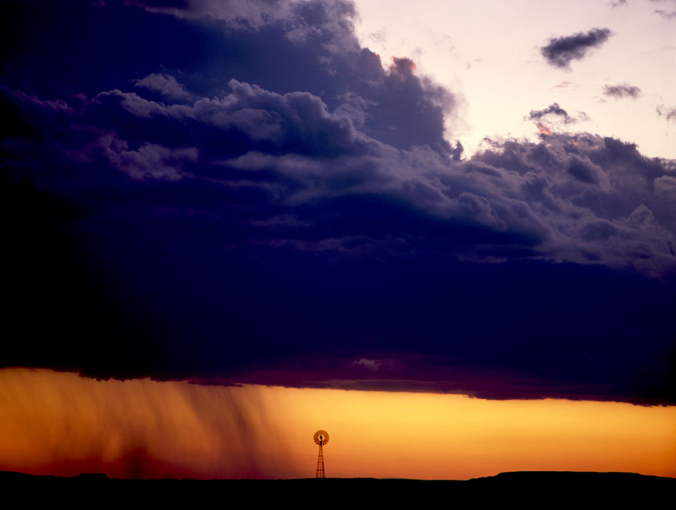 At sunset, a storm brings curtains of rain to an area near the Northeastern Arizona city of St. Johns, another spot along Francisco Vázquez de Coronado’s path.