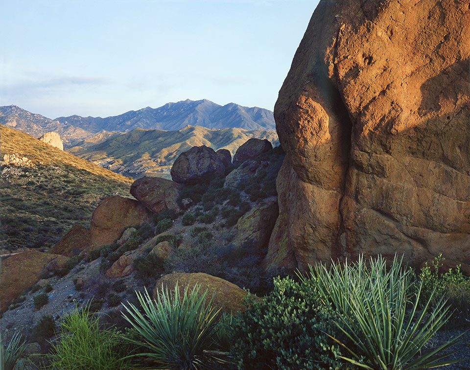 Boulders in the Coronado National Forest punctuate a view of the south side of Mount Turnbull (8,291 feet) in the Santa Teresa Mountains. This vantage point is about 30 miles west of Safford in Eastern Arizona.