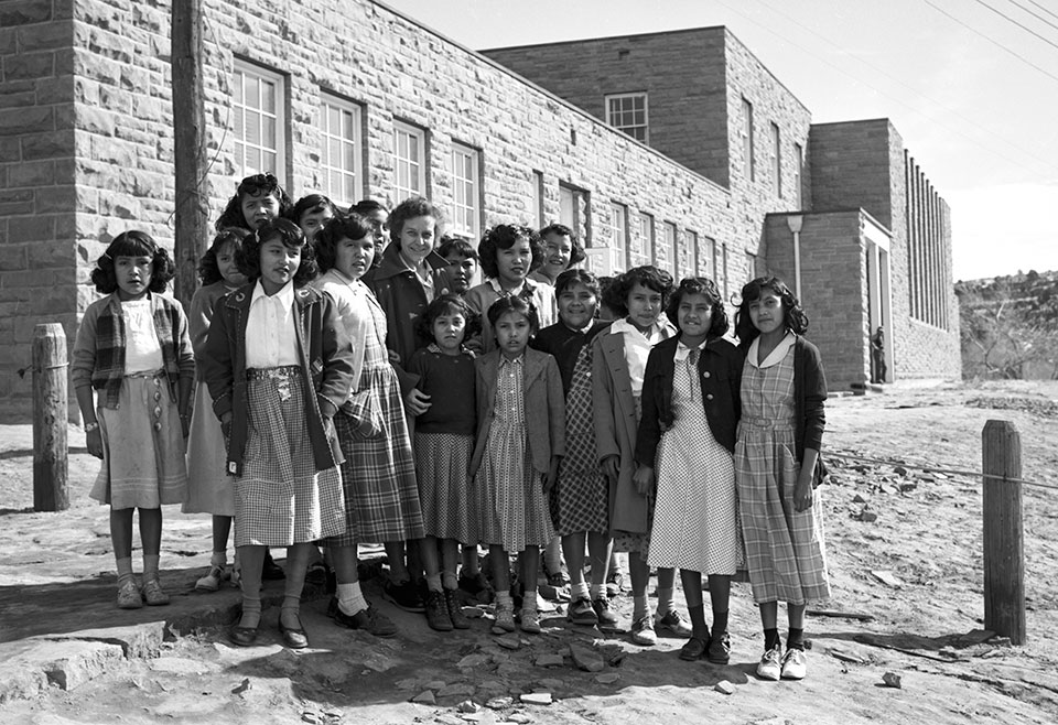 Students attending Keams Canyon Boarding School, on Hopi Tribe land, are shown outside the school in the mid-20th century. | Northern Arizona University Cline Library