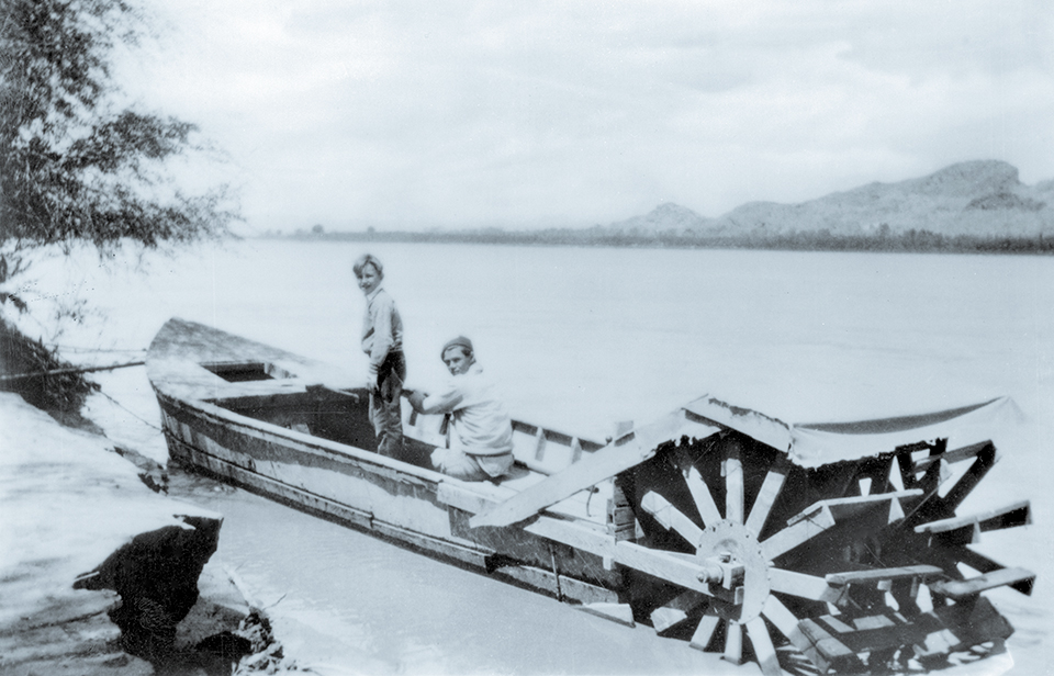 Stern-wheel boats, or “sternwheelers,” came in all shapes and sizes on the Colorado. In this photo from the late 1890s, a man and a boy pose for a photo on a small ferry in Yuma. | UNIVERSITY OF SOUTHERN CALIFORNIA DIGITAL LIBRARY, CALIFORNIA HISTORICAL SOCIETY COLLECTION