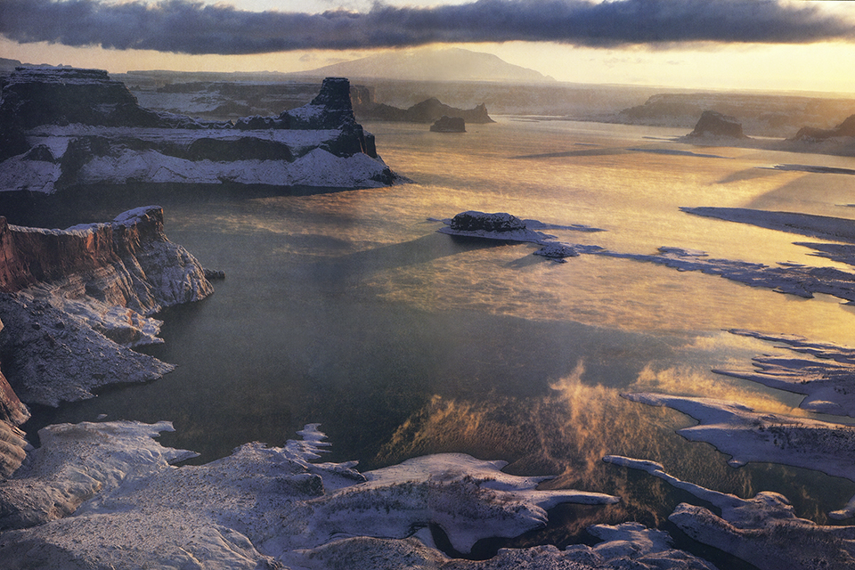 This Gary Ladd image, of the placid reservoir during a winter sunrise, is purely aesthetic, with the snowy landscape and distant Navajo Mountain adding to a wonderful combination of elements.