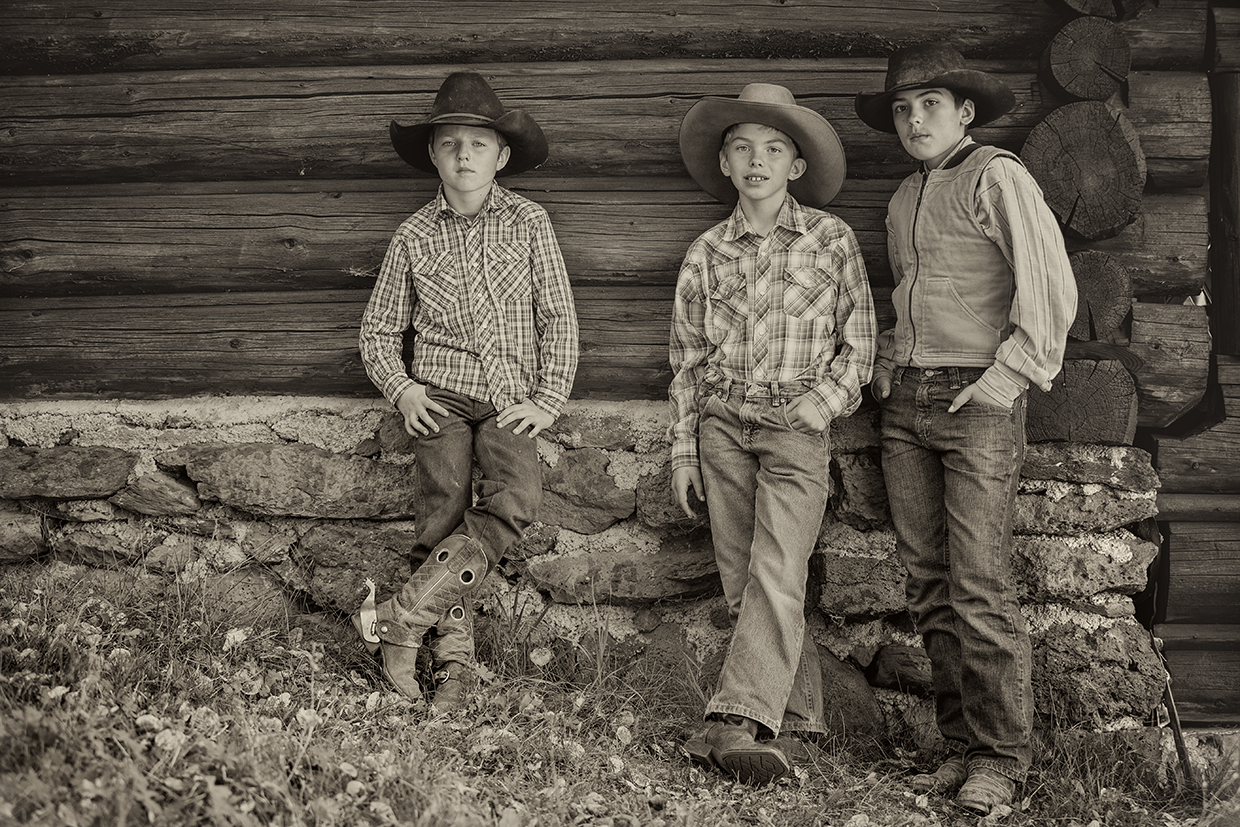Vinson Picozzi, Keaton Jasso and Kaden Summer are shown at the X Diamond’s Voigt Allotment in the Apache-Sitgreaves National Forests. By Scott Baxter