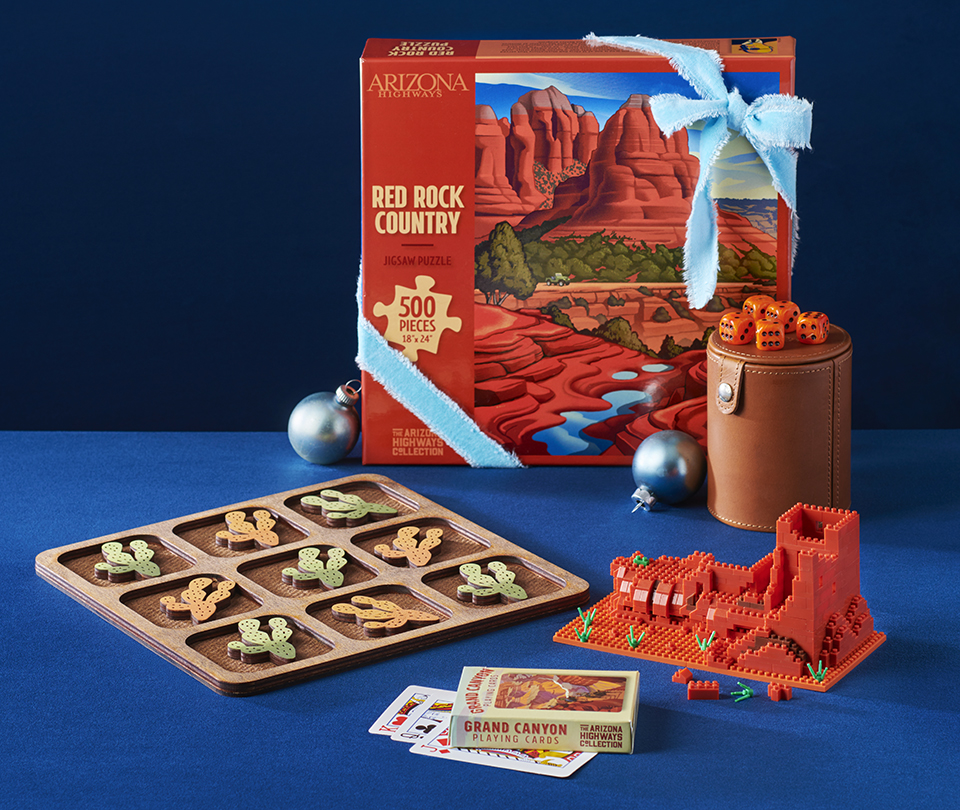 Gaming gifts include playing cards, a puzzle, a tic-tac-toe set, a leather dice cup and a Wupatki National Monument mini block set. By Rob Ballard