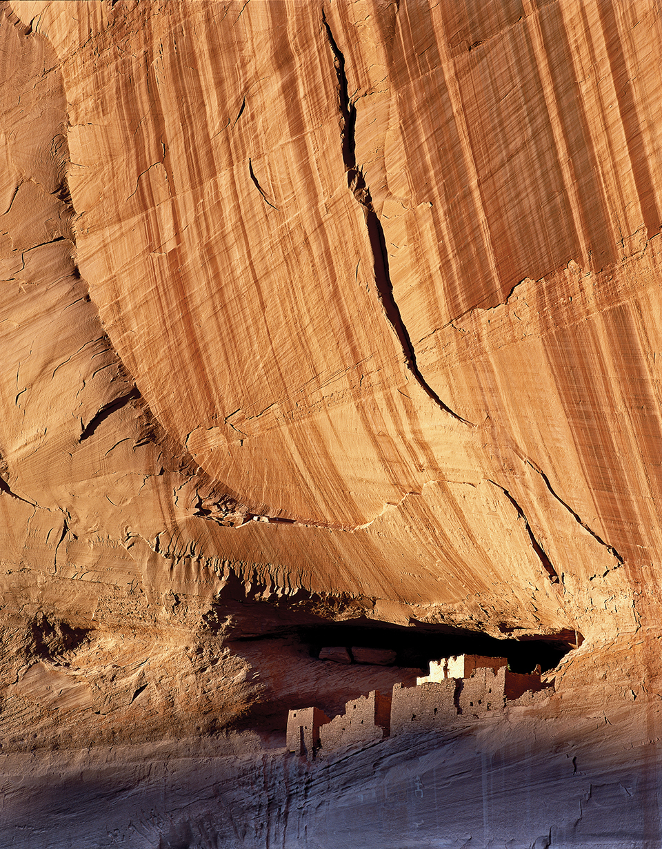White House Ruins: Nestled in a sandstone cave beneath a 600-foot sheer cliff, the secluded ruins overlook Canyon de Chelly (right). Ancient Puebloan people occupied the precarious cliff dwelling from the 9th through the 11th centuries. | George H.H. Huey