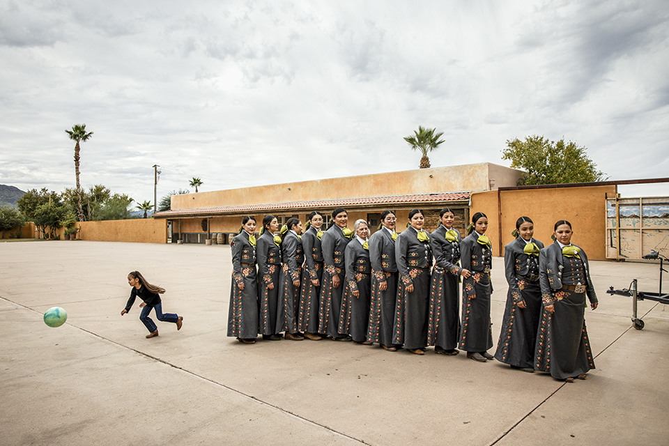 As a way to tie modern methods to a deeply traditional sport, members of Amazonas de Corazón line up to record a TikTok video before their Rancho Corona performance. | Adriana Zehbrauskas