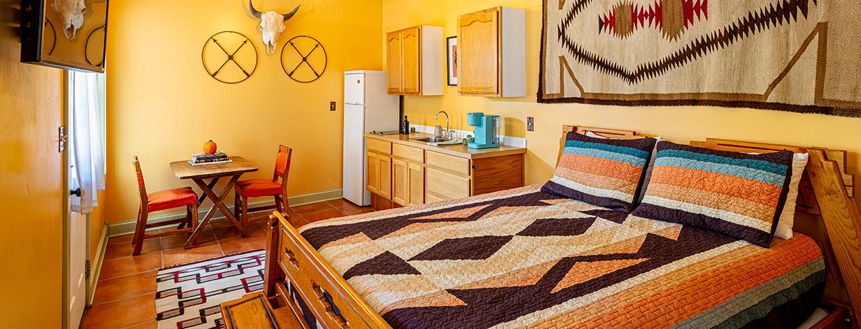 The Nopales Suite (pictured) is a one-bedroom, one-bathroom apartment with a kitchenette and western décor. By Steven Meckler