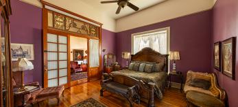 Interior of room at the Blenman Inn features classic Victorian design and modern amenities, such as the pictured ceiling fan. By Steven Meckler